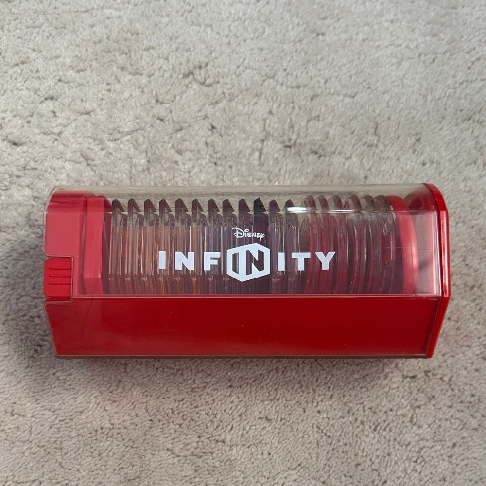 Disney Infinity Red Disc Holder with 18 Mystery Disks